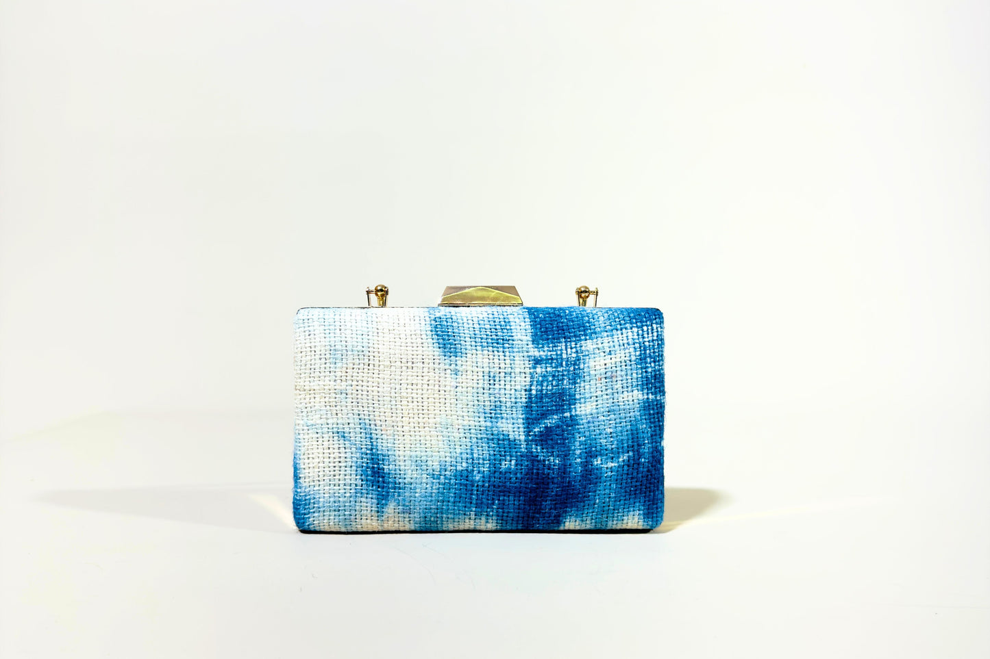 Blue and white tie-dye clutch bag